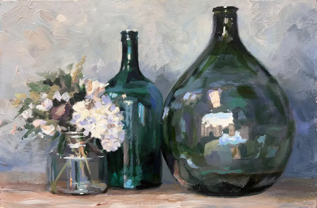 Vase of flowers and two glass jugs 